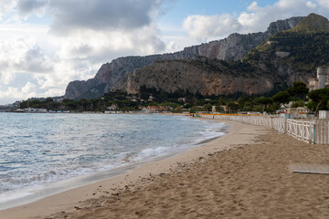 Stormy weather on seaside vacation destination, Mondello Beach, near Palermo in Sicily with fine, golden sand, turquoise waters and charming villas, South of Italy