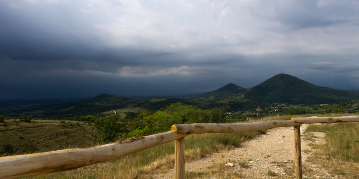 Stormy clouds and dark skies over the Eugean Hills - Powered by Adobe