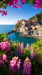 Obraz premium Coastal village framed by vibrant flowers