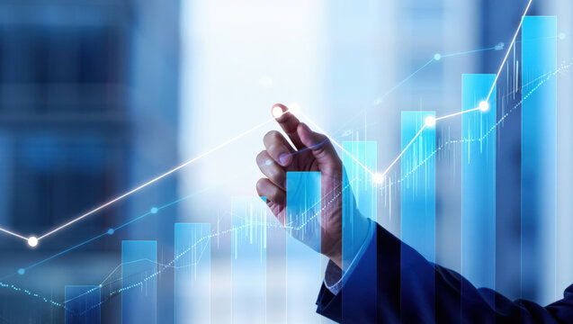 Visualizing Financial Growth A Hand Pointing at Rising Bar Graphs and Lines on a Blue Background Representing Market Trends and Economic Development with Clarity and Insight