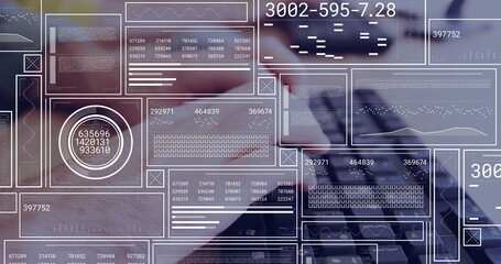 Typing software developer hands entering data on laptop keyboard at wooden desk, with data overlays