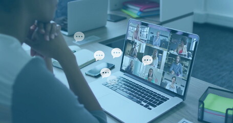 Joining woman in grey top connecting with remote team at office desk, with laptop, copy space