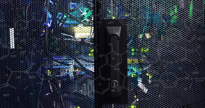 Highlighting black vertical latch locking perforated cabinet door in data center, with green LEDs - Powered by Adobe