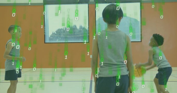 Left boy stepping forward making underhand pass in sports gym, practicing ball passing