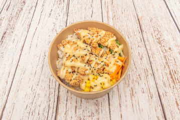 Kung Pao Chicken Rice: Cubes of beef with peanuts, dried chili, and the signature slightly spicy sauce