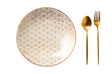 Elegant white plate with golden geometric design accompanied by a golden spoon and fork on a black background