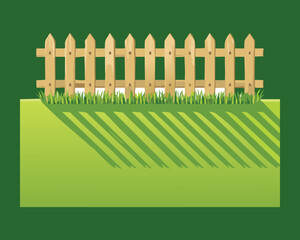 Picket Fence with a Long Shadow on Green Lawn