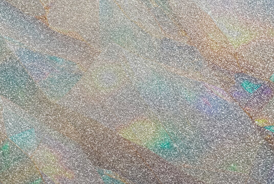 Opalite glass glitter background, iridescent sparkling glitter particles creating a gemstone fake opal textured effect for website, marketing and social media, abstract sparkles, multicolored sequins