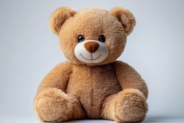close-up of a soft, fluffy brown teddy bear with a smiling face sitting against a plain light background, evoking warmth and comfort