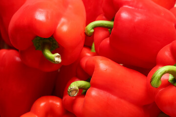 Texture of red bell peppers as background