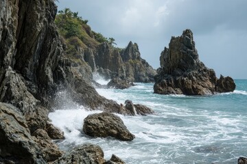 Naklejka premium Rocky coastline with crashing waves