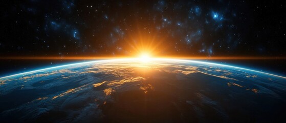 Obraz premium Sunrise over the Earth's horizon from space with glowing sunlight and visible atmospheric layer against starry night sky