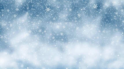Fototapeta premium Softly falling snowflakes creating a serene winter scene with a blurred snowy background and a calming blue sky