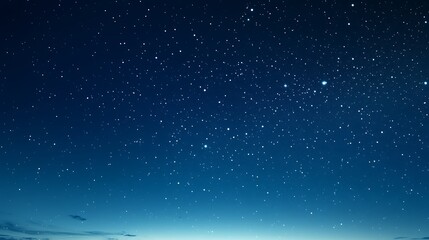 Fototapeta premium Deep Blue Night Sky Filled with Bright White Stars of Various Sizes, Transitioning to Light Blue at the Bottom with Faint Clouds, Resembling Vast Celestial Body, Implying Dawn or Horizon, Suitable for