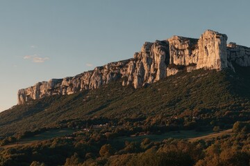 Light-dappled mountain range at sunset