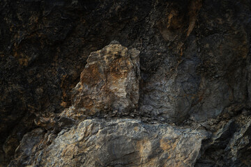 Black dark brown gray stone rock granite mountain background. 3d. Niche stage podium stand. Product display. Design. Template. Rough strong strength strong solid hard. Outdoor. Nature.