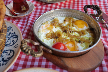Delicious breakfast dish served on a wooden table