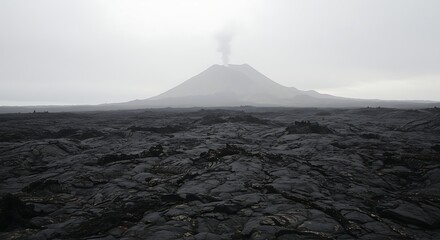 Ethereal Landscape of Iceland Volcanic Terrain with Lava Fields and Volcanic Cone against Misty Sky Scenic View of Volcanic Activity