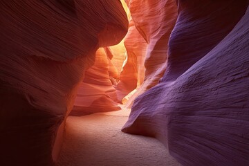 Obraz premium Sunlight streams through a narrow, colorful slot canyon