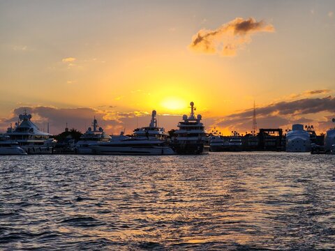 oil tanker at sunset - Powered by Adobe