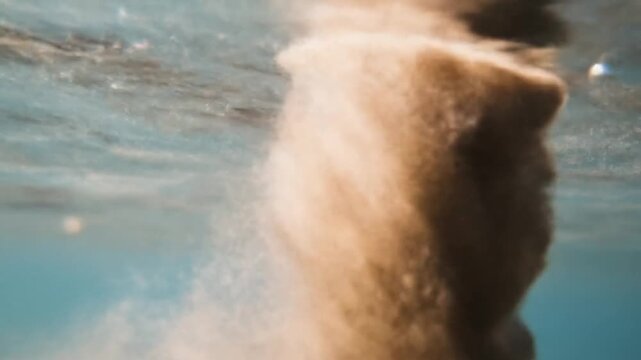 Underwater Sand Stream in Azure Water - Mesmerizing Aquatic Sandfall Stock Footage