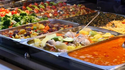 Delicious buffet featuring various cuisines in a dining area