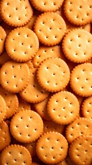 Golden brown crackers background forming textured aesthetic food backdrop