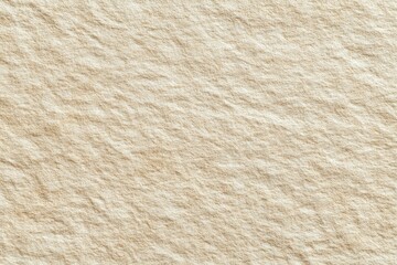 Close-up view of a light beige textured surface