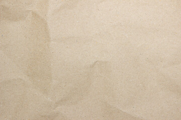 Brown recycled kraft paper crumpled vintage texture background for letter. Abstract parchment old retro page grunge blank.