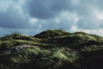 Naklejka premium Lush grassy hills under a stormy sky