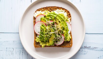 Delicious Avocado Toast Topped with Radishes and Sprouts on a White Plate,  Healthy Breakfast Toast with Avocado, Radishes, Sprouts, and Cream Cheese