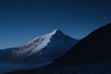 Majestic snow-capped mountain peak under a starry night sky