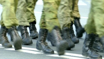 army military Small group of marching soldiers Marching Soldiers with Military Equipment and Armoured