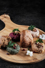 A beautiful arrangement of Colorful Assorted Gourmet Breads displayed on