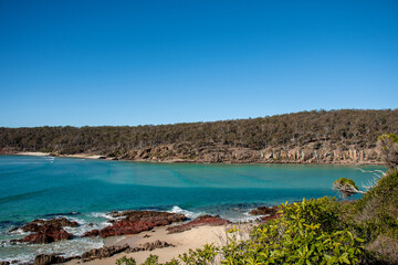 Scenic view of a beautiful ocean beach on a sunny day. Idyllic Pambula Beach on Sapphire Coast near Merimbula, NSW, Australia