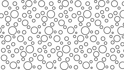 A pattern of various sized outlined circles