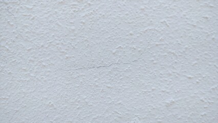 White detail wall on the background. The pattern of surface wall concrete for background. Abstract of surface wall concrete for vintage background.
