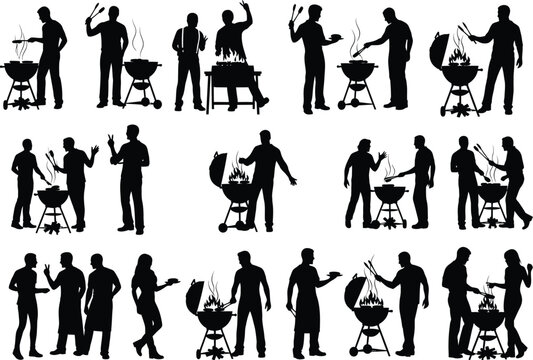 Silhouettes of people enjoying a summer barbecue with grills and food preparation in a casual outdoor setting