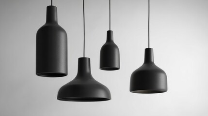 Naklejka premium Set of contemporary matte black hanging lamps, minimal design, isolated on white background