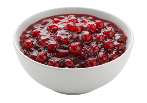 Close-up of a white bowl filled with freshly cooked red berry jam on a black background