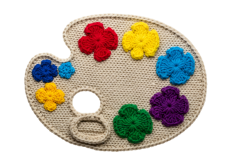 Colorful crocheted artist palette with flower motifs and a hole for mixing paints suitable for