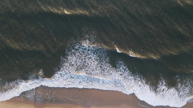 Waves hit the coastline of Portugal at sunset 3 diferent framing and movement of nr 1 and 2
