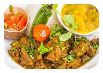 Massalé cabri réunionnais, riz, grains et rougail tomates 