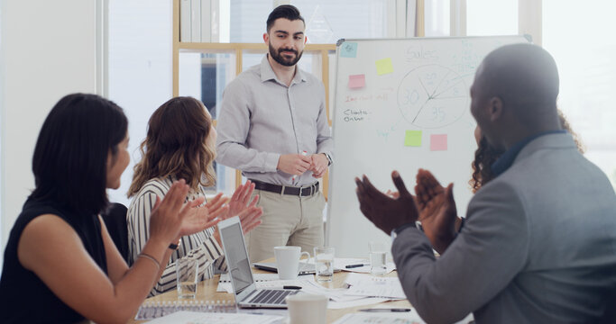 Team, presenter or applause for business man with chart, sales goal or target. Happy group, presentation or clap in workshop to celebrate success or thank you for financial training in office meeting - Powered by Adobe