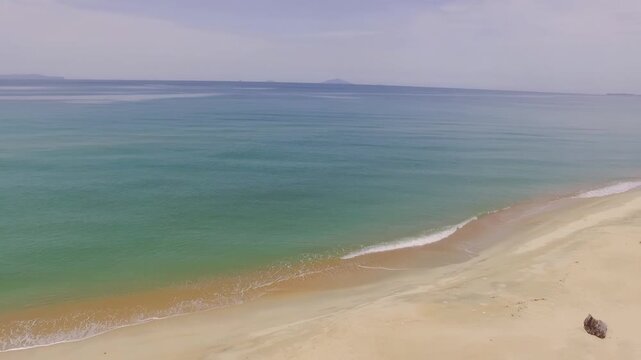 Left-moving drone view at the beach in Besut, Terengganu