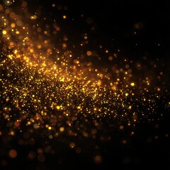 Golden glitter sparkles on black background