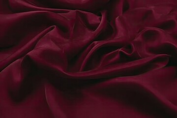 Obraz premium Deep burgundy silk fabric draped in folds