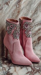 Pink suede ankle boots with crystal embellishments