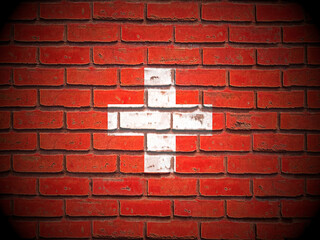 Old brick wall Switzerland flag