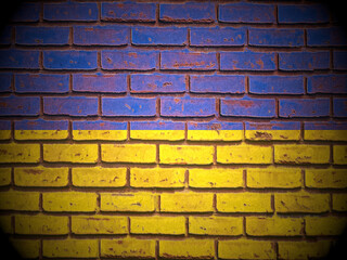 Fototapeta premium Old brick wall Ukraine flag
